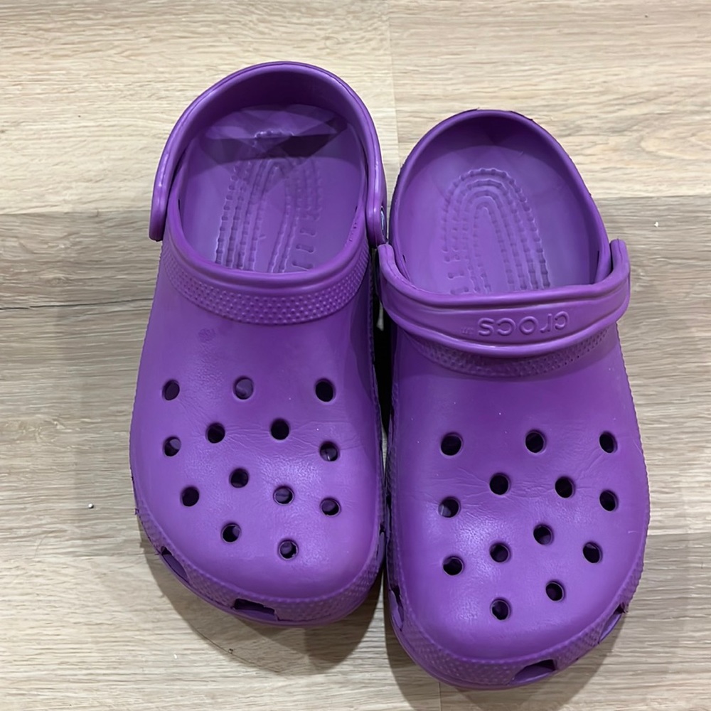 Gently used crocs, purple. Standard style.